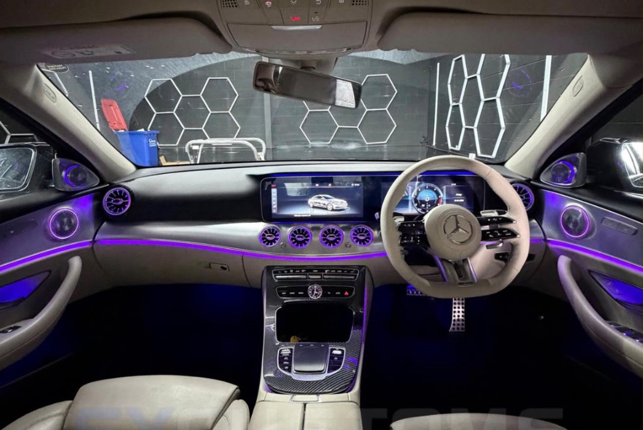 Mercedes interior cockpit with purple ambient lighting